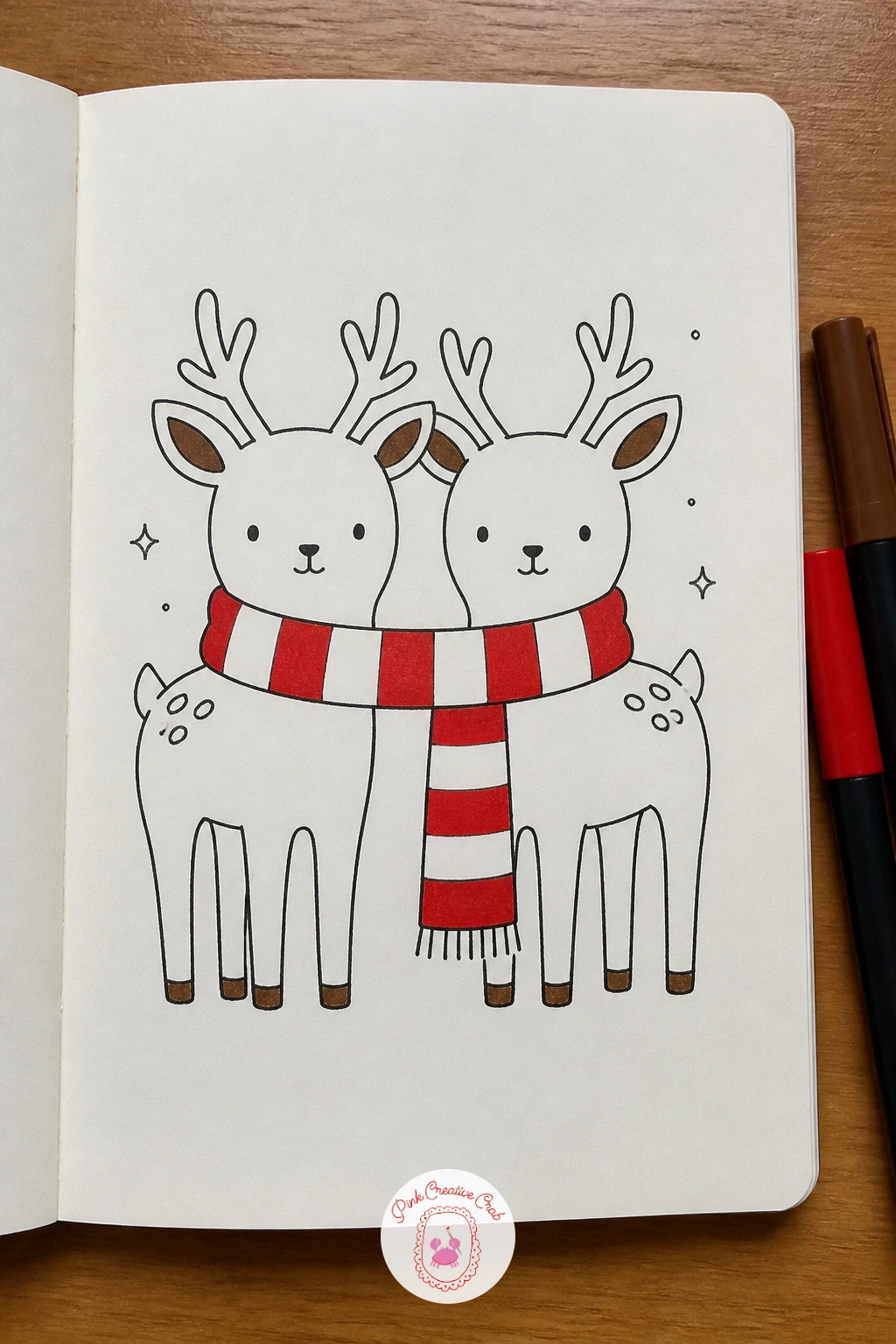 Two Deer Sharing One Scarf — Draw two adult deer standing side by side, both wrapped into opposite ends of one long shared scarf. Deer doodle