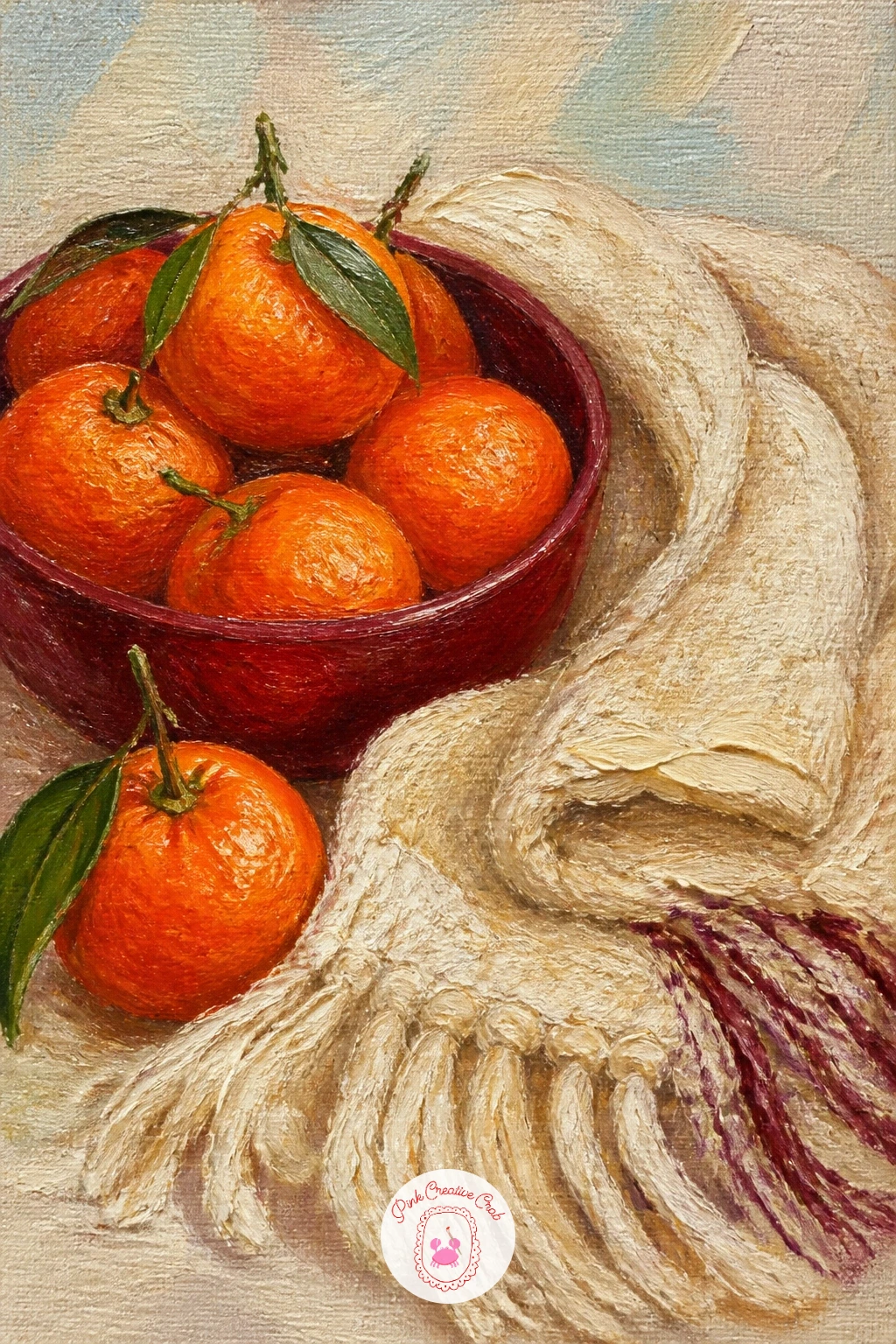 Clementines Beside a Wool Scarf — A bowl of clementines beside a folded cream wool scarf pairs the brightest colour on this whole list against the softest