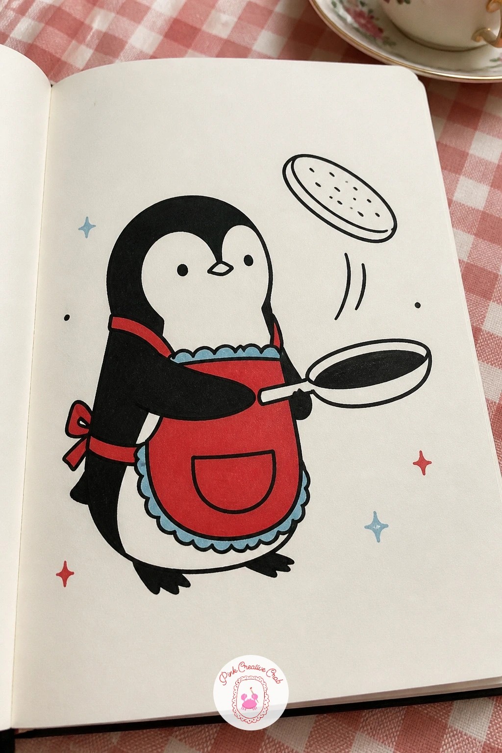 Penguin Flipping Pancakes In An Apron — Stand this penguin at a small stove or just holding a frying pan directly, since the apron and the action carry the
